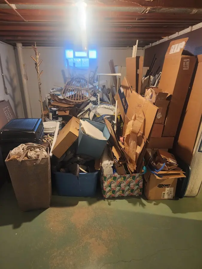 Roll-off dumpster container at job site for Yard Waste Dumpster Rental in Moreau